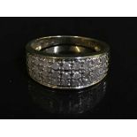 A diamond set gold bombay style half eternity ring approximately 0.5ct.