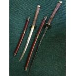 Two Samurai style swords in scabbards