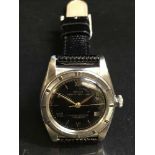 A vintage Rolex bubble back Oyster stainless steel wrist watch, numbered 458722.