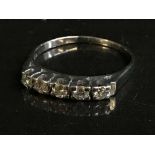 An 18ct white gold five stone diamond ring