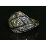 An 18ct diamond and sapphire Art Deco style cluster ring