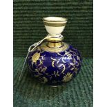 A late nineteenth century Minton gilded bulbous vase on cobalt ground, height 10.5 cm.