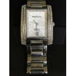 A Diamond and Co Gentleman's wrist watch, in original retail box,