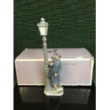 A Lladro figure 'The Lamplighter', boxed,