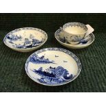 An eighteenth century blue and white English miniature tea bowl and saucer, probably Caughley,