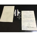 A military cross on suspension ribbon with various paperwork awarded to Captain A E Crowder,