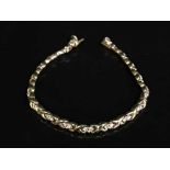 An 18ct gold bracelet set with thirty-six diamonds approximately 1ct, 14.95g.