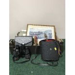 A box of binoculars, military buttons, military print,