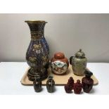 A pair of cliosonne vases, ginger jar, wooden stands,
