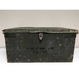 An antique canvas lined wooden trunk