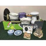 A box of Ringtons ware tins, cottages,
