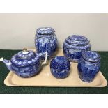 A tray of Ringtons blue and white caddies and a teapot