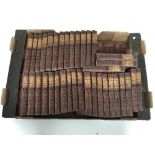 A box of Thomas Carlyle novels