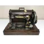 A SInger sewing machine in case