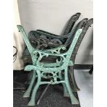 Four pairs of metal garden bench ends