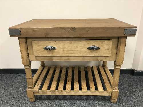 A reclaimed pine butcher's block fitted with a drawer