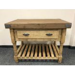 A reclaimed pine butcher's block fitted with a drawer