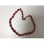 A Vintage strawberry Jade necklace