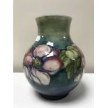William Moorcroft vase, Clematis pattern with blue\green background, circa 1950's, height 19cms.
