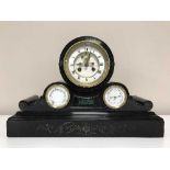 A Victorian black slate mantel clock with enamelled dial thermometer & barometer appertures