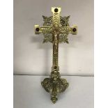 A gilt metal crucifix