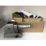 Five boxes of assorted photographic and projector equipment - lights, screens,