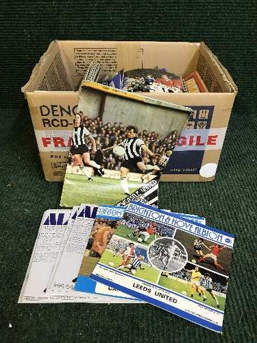 Two boxes of assorted football programmes