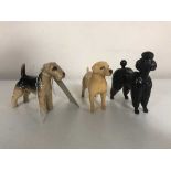 Three small Beswick figures - Labrador poodle and terrier