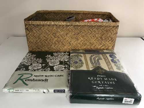 A basket and box of assorted table linen, curtains,