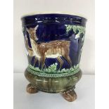 A Majolica style planter depicting deer