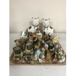 A tray of china figures, dogs, Wade whimsies,