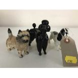 Three small Beswick figures - poodle,