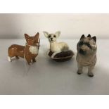 Three small Beswick figures - terrier,