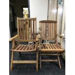 Two teak folding garden armchairs