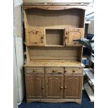 A pine effect kitchen dresser
