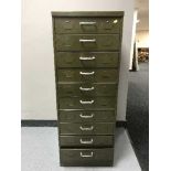 A metal ten drawer dentists filing chest