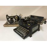 A vintage Royal typewriter and mid 20th century Jones sewing machine