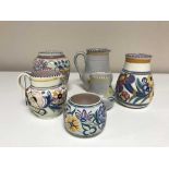 Six pieces of Poole pottery inc.