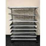 A set of eight tier metal shelves on wheels