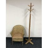A gold loom chair and a hat & coat stand