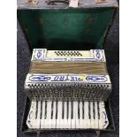 A cased Pietro piano accordion