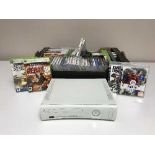 A box of Xbox console, games,