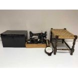 An electric Singer sewing machine, deed box,