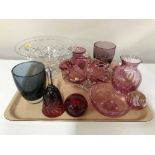 A tray of assorted cranberry and ruby glass ware, glass fruit bowl,