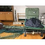 A folding Sentinel fishing chair, two rods, pole rod, Ron Hutchinson shelter,