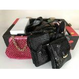 Two boxes of assorted lady's hand bags and shoes