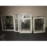 Ten framed leaded stained glass windows