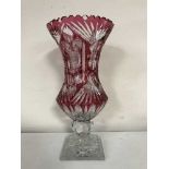 A large ruby crystal vase