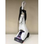 A Bissell clean view carpet cleaner