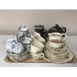 A tray containing antique Balmoral china tea service, together with one other,